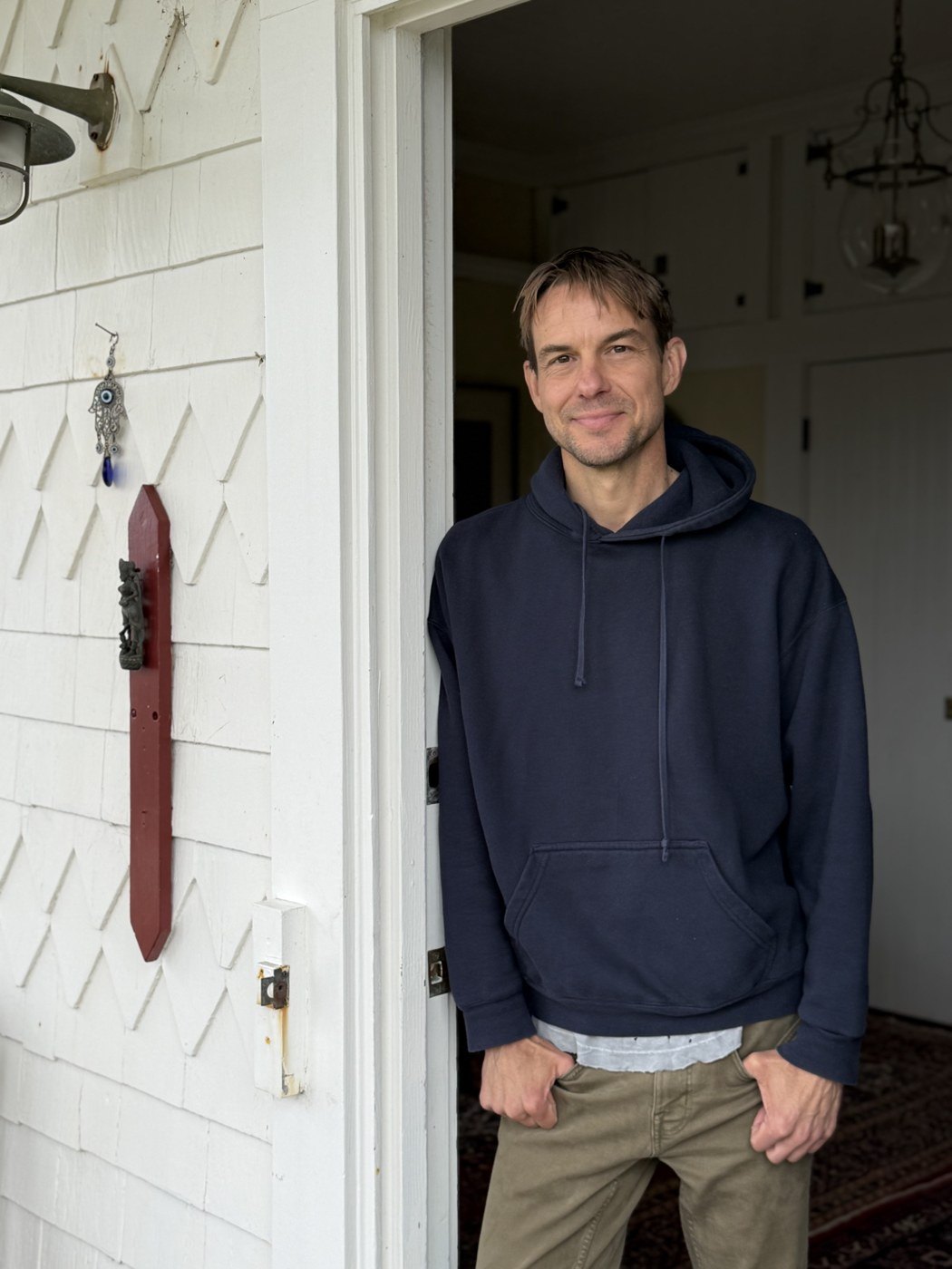 Scott Picard smiling in an open doorway